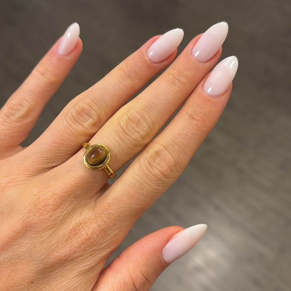 Size 7 gold adjustable ring with brown stone pendant